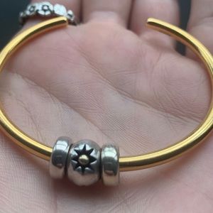 Gold Bangle with Rare Bead Trollbeads